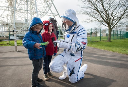 Two boys with "spaceman" at Jodrell Bank discovery-centre