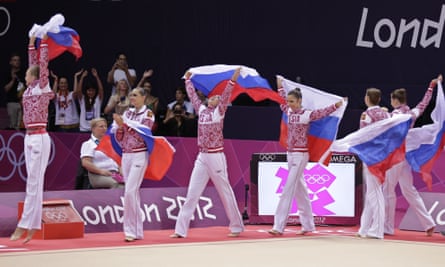 Team Russia celebrate winning the gold medal during the rhythmic gymnastics group all-around final at the 2012 Summer Olympics in London.