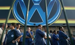 FILES-BRAZIL-GERMANY-AUTOMOBILE-CRIME-HISTORY-RIGHTS<br>(FILES) In this file photo taken on August 03, 2003, Brazilian Volkswagen metalworkers chat as they wait for the start of a meeting in Sao Bernardo do Campo, 25 km from Sao Paulo, Brazil. - Volkswagen said on September 23, 2020 it had signed a deal with prosecutors to compensate former workers at the company’s Brazil unit for rights violations committed during the South American country’s military dictatorship. (Photo by MAURICIO LIMA / AFP) (Photo by MAURICIO LIMA/AFP via Getty Images)