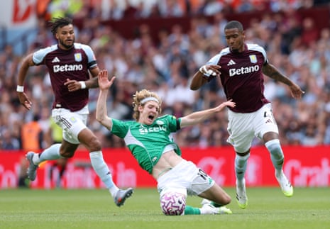 Anthony Gordon of Newcastle United is fouled by Ezri Konsa of Aston Villa