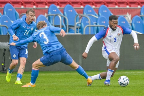 Duckens Nazon skips past the challenge of Hjörtur Hermannsson during Haiti’s friendly against Iceland in March.