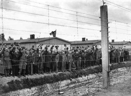 Prisoners at Dachau concentration camp cheer troops who liberated the camp in 1945.