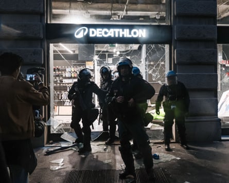 Damage to a Decathlon store in Milan following clashes between protesters and police.