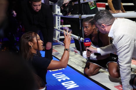 Caroline Dubois (right) clashes with Alycia Baumgardner (left) after retaining her WBC and WBO lightweight titles with a unanimous-decision win over Amelia Moore in Birmingham.
