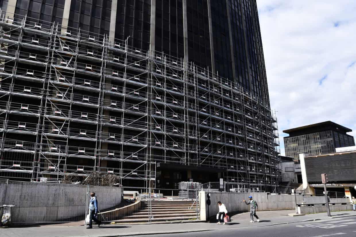 Tour Montparnasse exterior at ground level, with scaffolding in place.