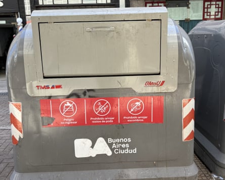 A large rubbish bin on the street