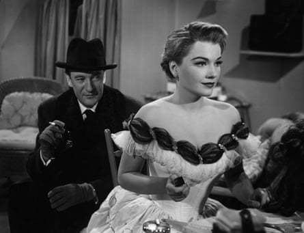 Anne Baxter as the duplicitous Eve and George Sanders as the theatre critic and narrator in All About Eve.