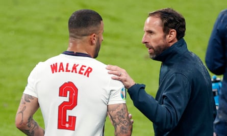Gareth Southgate speaks with Kyle Walker during the Euro 2020 final against Italy in July 2021.