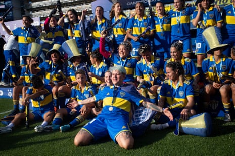 Boca’s Yamila Rodríguez and her teammates celebrate after winning the champions trophy in September 2022.
