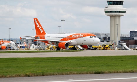 An Easyjet Airbus aircraft taxis close to the northern runway at Gatwick Airport in Crawley, Britain.