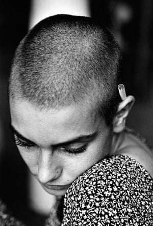 Sinead O’Connor, 1992This portrait was taken backstage during a concert rehearsal with scores of people milling about. Over and over again throughout her career, Jane managed to capture images which radiate calm and intimacy.