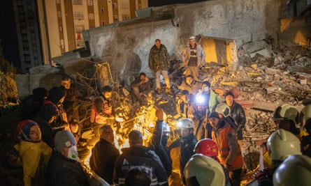 Search and rescue efforts in an apartment destroyed in the earthquake in Adana, Turkey.