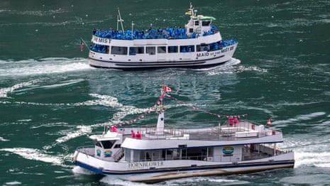 'Not safe': Niagara Falls tour boats show US and Canada's different responses to Covid-19 – video