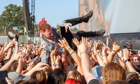 Frank Carter crowdsurfs at Reading festival, 25 August 2019.