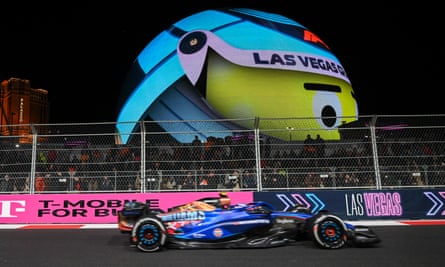 Logan Sargeant dives past the Sphere during the 2023 Las Vegas Grand Prix