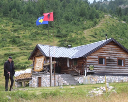 ‘Locals in Gacaferi fly red Albanian flags alongside Kosovo blue.’