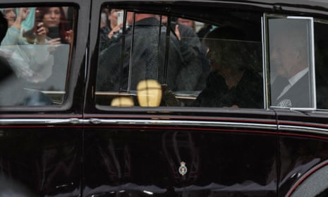 King Charles and the Queen Consort arrive at the Buckingham Palace on Tuesday evening. REUTERS/Maja Smiejkowska
