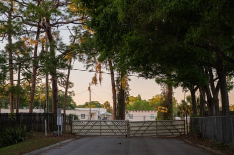 ‘It’s hell’: life under the American mobile home king who calls himself a ‘grave dancer’ Dilapidated looking gates