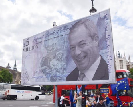 A billboard showing a banknote with Nigel Farage’s face on it.