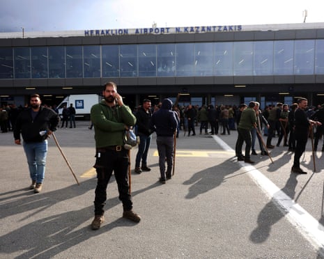 Dozens of farmers standing on apron area at Nikos Kazantzakis International Airport in Heraklion, the main town of Crete Island, southern Greece.