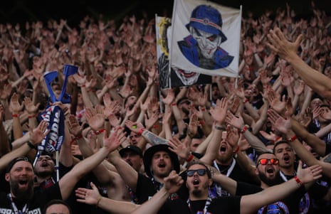 PSG supporters cheer ahead of the Champions League semi-final first leg at Borussia Dortmund.