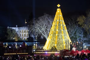 The Obama family including Michelle’s mother mariian Robinson and the actress Reese Witherspoon officiate at the tree lighting ceremony in Washington