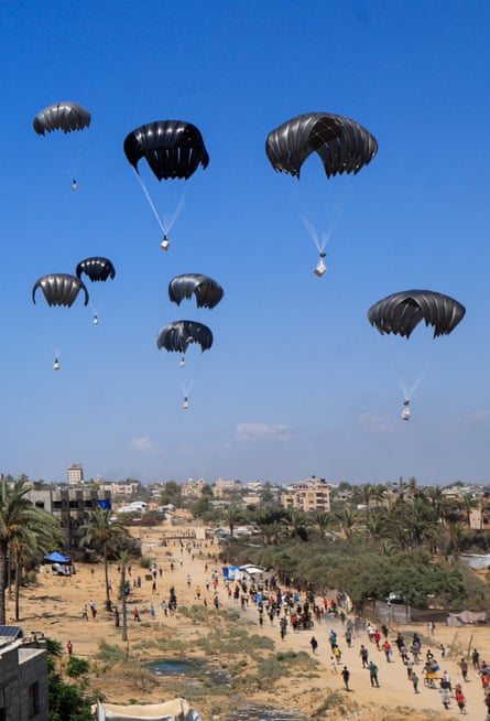 Air-dropped aid packages descend into Gaza