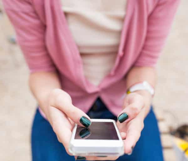 Woman uses a smartphone