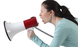 Woman shouting into megaphone