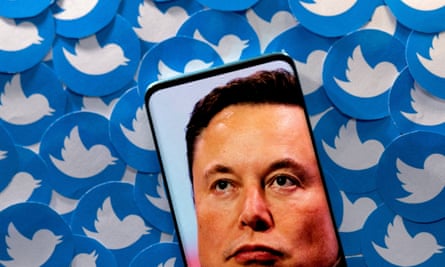 Illustration shows Elon Musk image on smartphone and printed Twitter logos.
