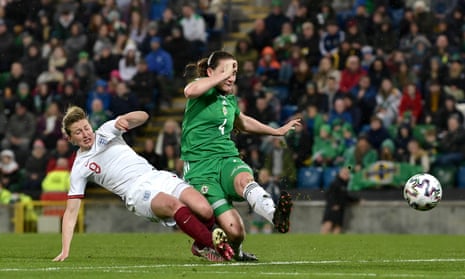 Ellen White of England shoots under pressure from Sarah Mcfadden of Northern Ireland.
