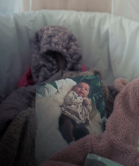 A photograph of Zammi in the cradle Keira had prepared for her