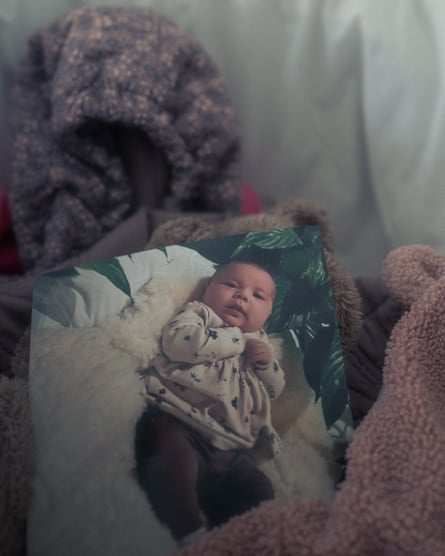 A photograph of Zammi in the cradle her mother had prepared for her.
