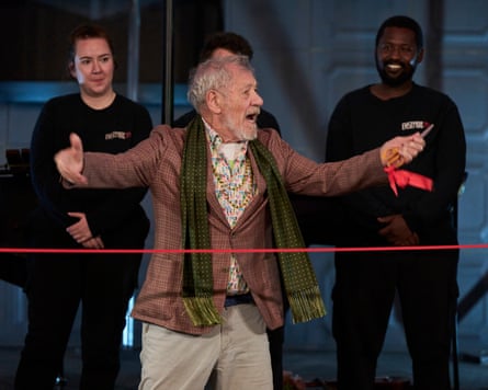 Ian McKellen cuts the red ribbon