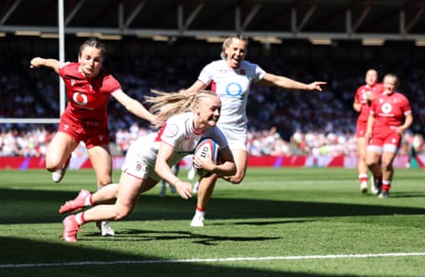 England debutant Millie David smiles as she dives over the line to score her side’s second try against Wales.