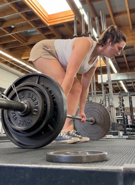 Casey Johnston lifting weights