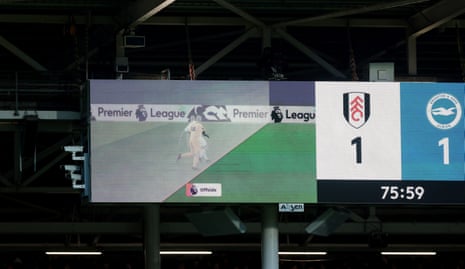 The big screen at Fulham shows the VAR decision of offside against Brighton's Danny Welbeck.