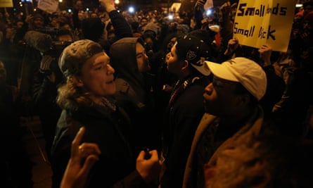 Trump supporters and protesters clash outside the UIC Pavilion after the rally was cancelled.