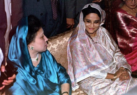 Zia, left, in 1997 with Sheikh Hasina, the then prime minister and her longtime political rival, at a wedding reception for Zia’s son Arafat.