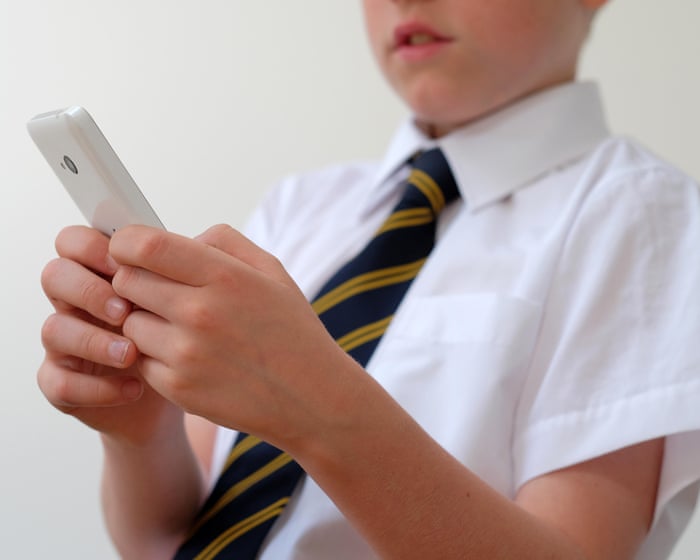 School smartphone bans seen as ‘punitive’ by young people, study says
