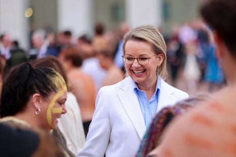 Sussan Ley (C) watches the smoking ceremony.