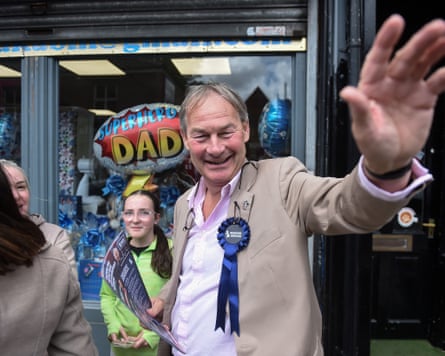 Rupert Lowe waves while on the campaign trail in Makerfield