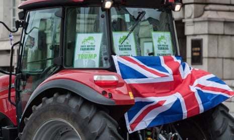 A tractor driver takes part in a protest against the agriculture bill in London in July