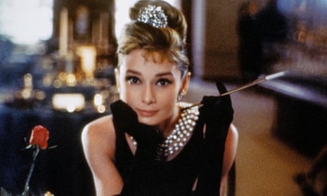 Audrey Hepburn in the 1961 film of Truman Capote’s Breakfast at Tiffany’s, source of the original Little Black Dress. 