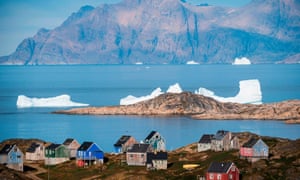 Icebergs float behind the town of Kulusuk in Greenland on 16 August 2019. 4851.jpg?width=300&quality=85&auto=forma