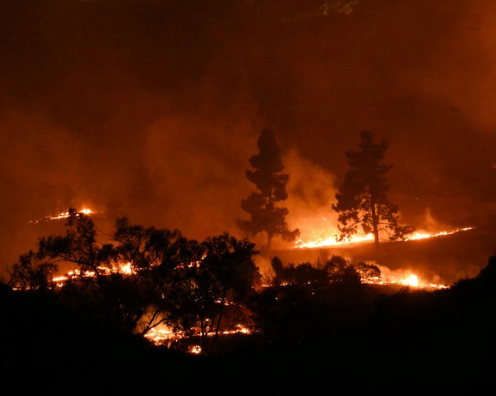 California brush fires force evacuations and tens of thousands of power shutoffs