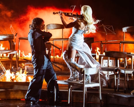 Finnish singers Linda Lampenius and Pete Parkkonen, representing Finland with the song ‘Liekinheitin’, perform during the first semi-final of the Eurovision song contest 2026 (ESC) at Wiener Stadthalle in Vienna, Austria.
