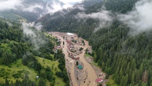 A drone image shows an area damaged by flood water