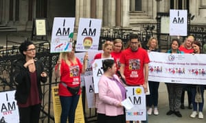 Special educational needs funding campaigners outside the Royal Courts of Justice, London.