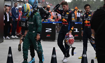 Max Verstappen and Sergio Pérez walk together after the Italian Grand Prix.